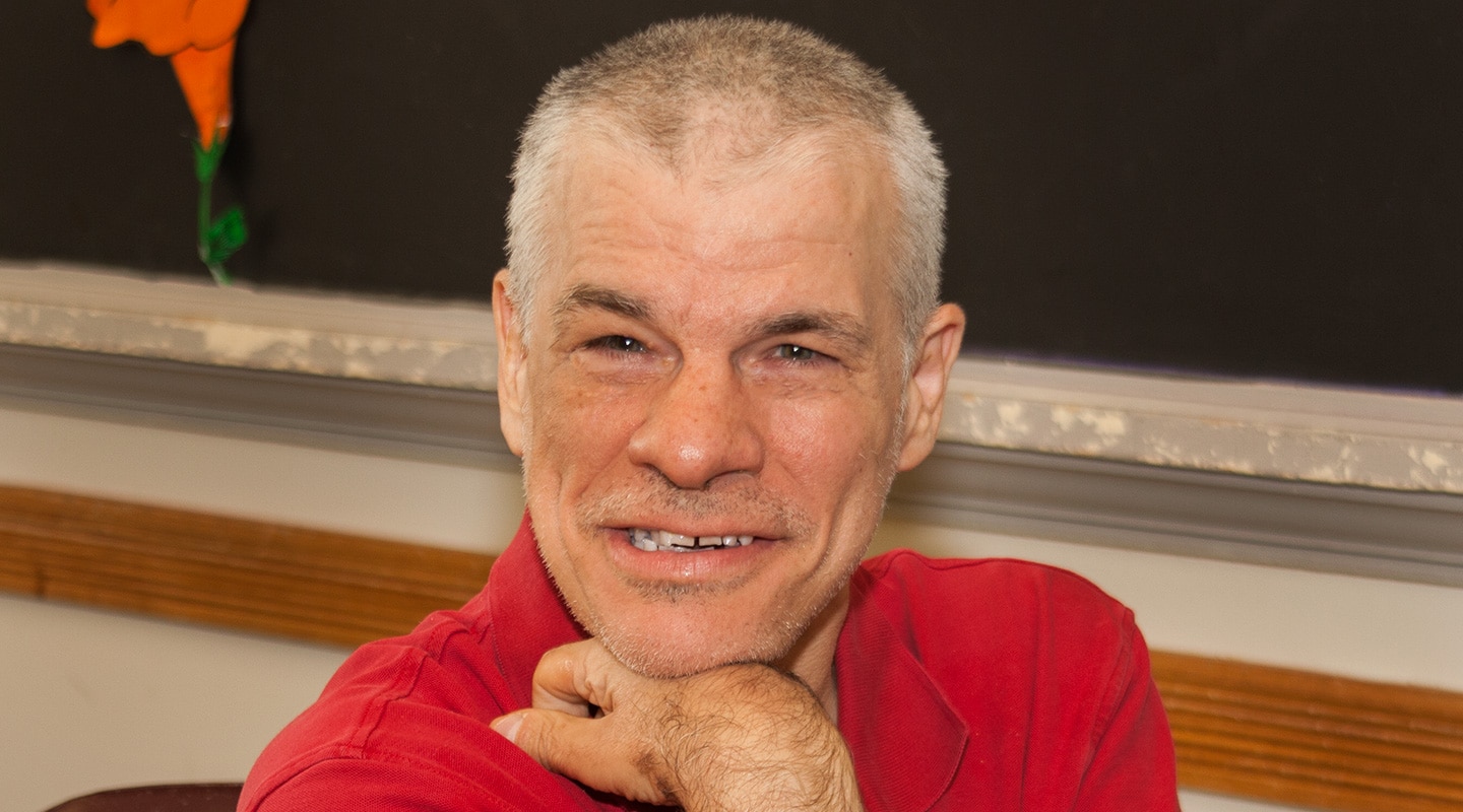 Man posing and smiling