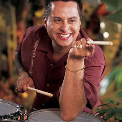 Tito Puente Jr holding drum sticks