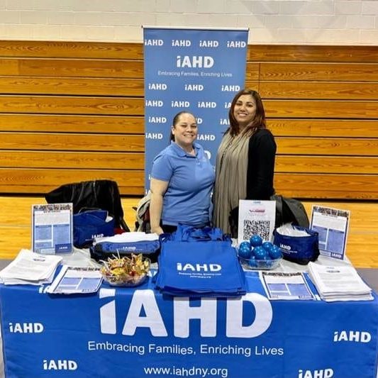 IAHD team members at a college fair